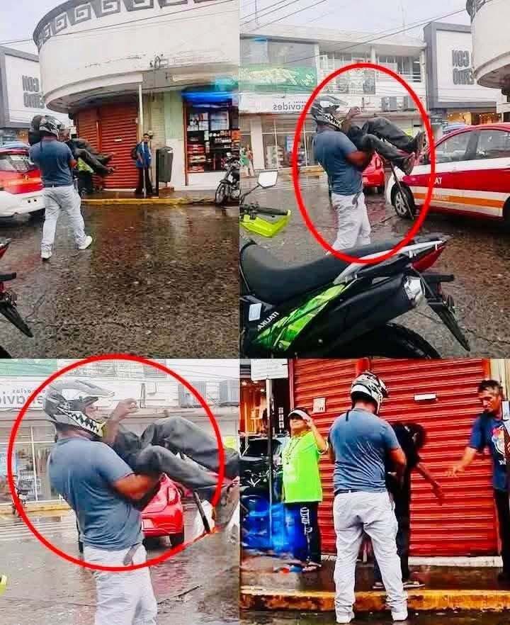 Motociclista cargó a un perro para ponerlo a salvo en medio de una fuerte lluvia