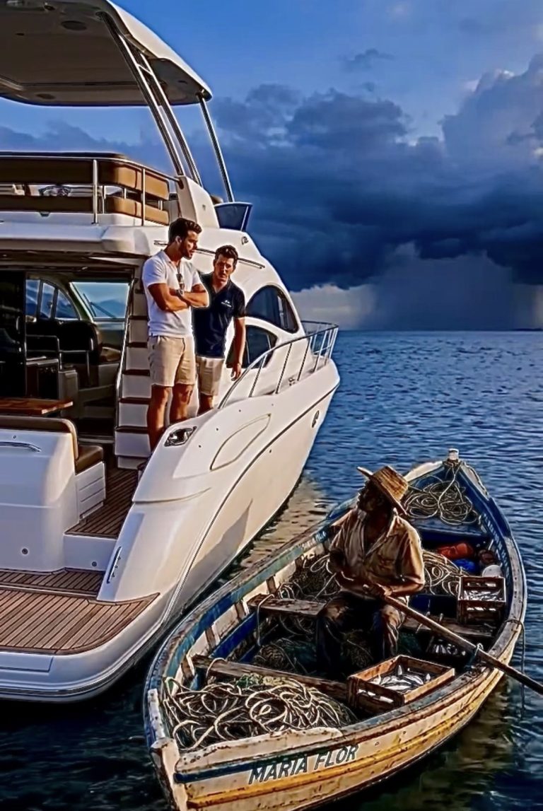El pescador y el yate de lujo